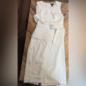 WHBM Peplum Midi Dress SZ 10 fabric is fitted and and very stretchy